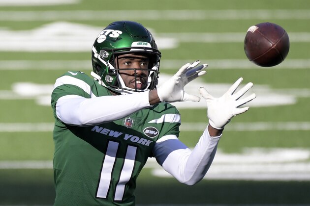 New York Jets wide receiver Denzel Mims (11) warms up before an NFL football game against the Las Vegas Raiders, Sunday, Dec. 6, 2020, in East Rutherford, N.J. (AP Photo/Bill Kostroun)