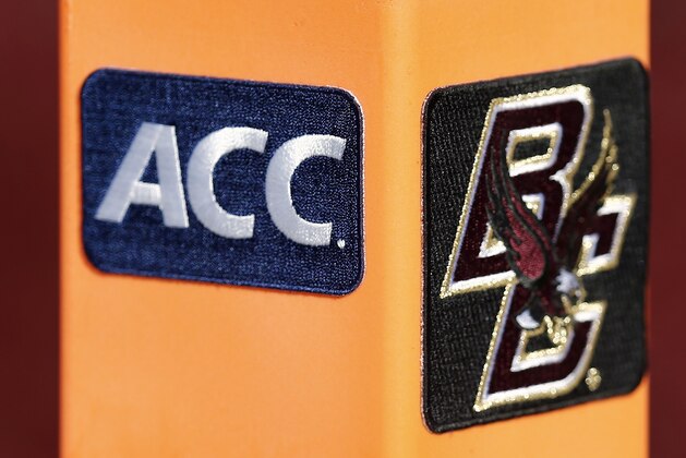 The Boston College logo on a pylon with the ACC logo is seen during the fourth quarter of their 34-27 win over Virginia Tech in a college football game at Alumni Stadium in Boston, Saturday, Nov. 2, 2013. (AP Photo/Winslow Townson)