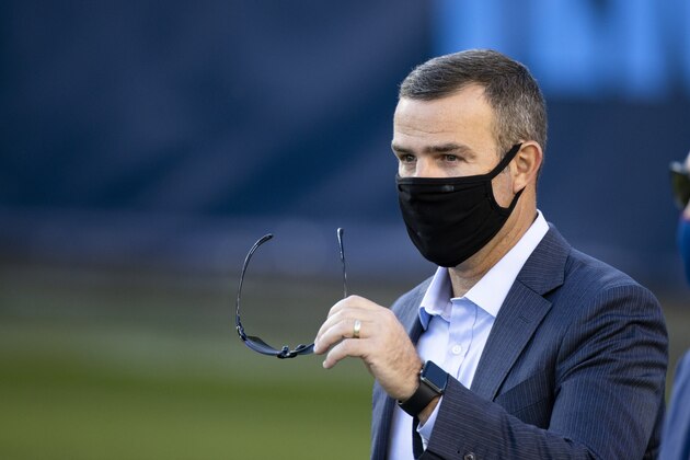 Buffalo Bills general manager Brandon Beane walks on the field before an NFL football game against the Tennessee Titans, Tuesday, Oct. 13, 2020, in Nashville, Tenn. (AP Photo/Brett Carlsen)