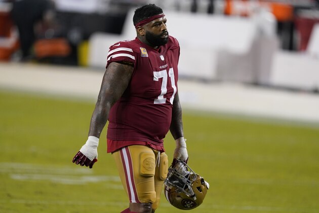 San Francisco 49ers offensive tackle Trent Williams (71) walks off the field after the 49ers were defeated by the Philadelphia Eagles in an NFL football game in Santa Clara, Calif., Sunday, Oct. 4, 2020. (AP Photo/Tony Avelar)