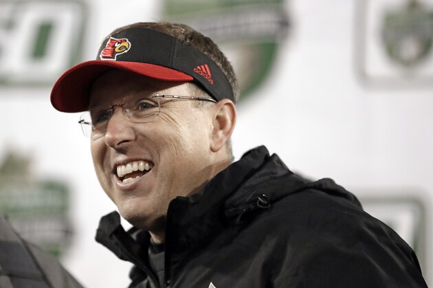Louisville head coach Scott Satterfield is interviewed after the Music City Bowl NCAA college football game against Mississippi State Monday, Dec. 30, 2019, in Nashville, Tenn. Louisville won 38-28. (AP Photo/Mark Humphrey) Louisville head coach Scott Satterfield is interviewed after the Music City Bowl NCAA college football game against Mississippi State Monday, Dec. 30, 2019, in Nashville, Tenn. Louisville won 38-28. (AP Photo/Mark Humphrey)