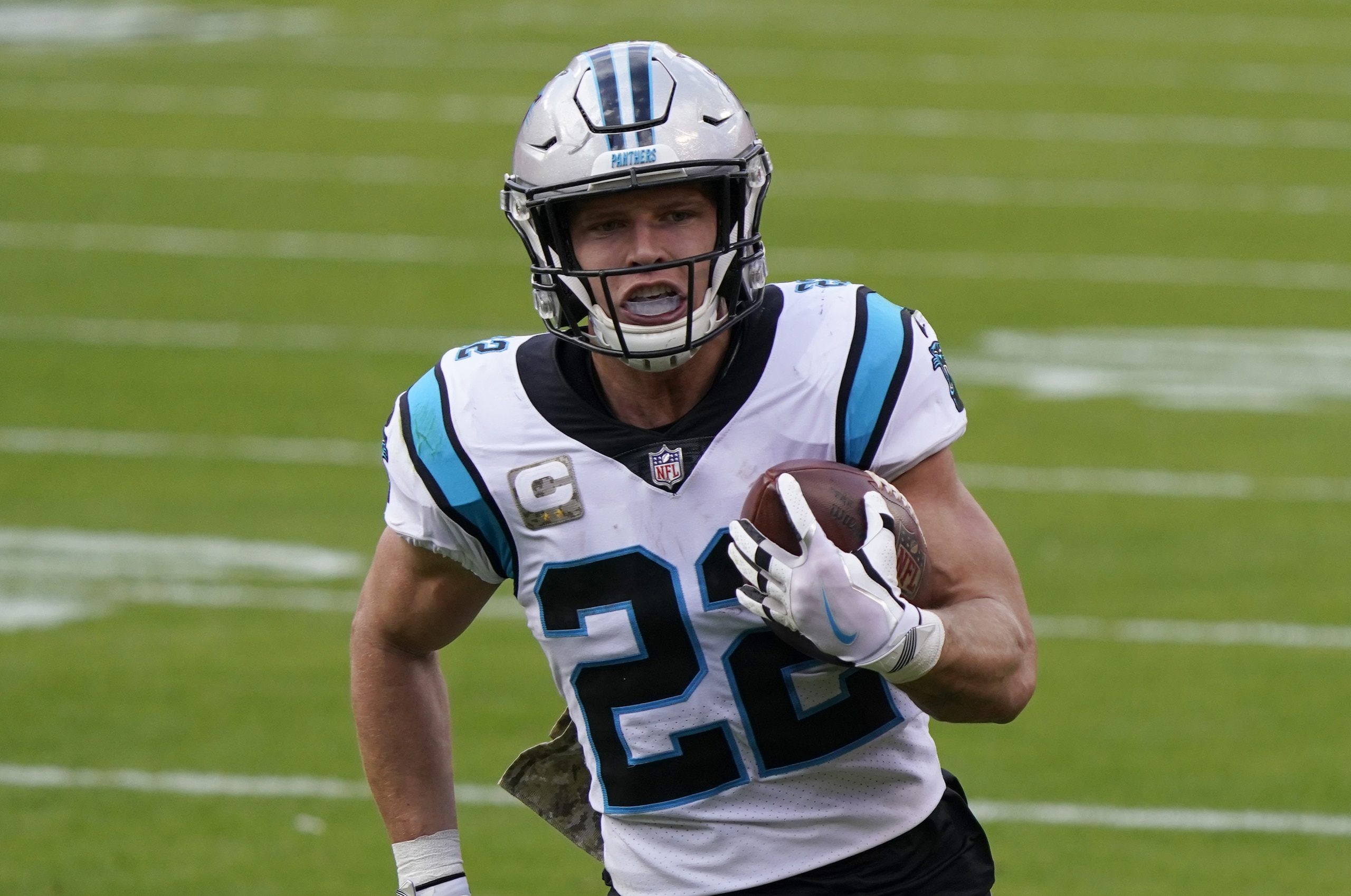 Carolina Panthers running back Christian McCaffrey runs with the ball during an NFL football game against the Kansas City Chiefs Sunday, Nov. 8, 2020, in Kansas City, Mo. (AP Photo/Jeff Roberson) Carolina Panthers running back Christian McCaffrey runs with the ball during an NFL football game against the Kansas City Chiefs Sunday, Nov. 8, 2020, in Kansas City, Mo. (AP Photo/Jeff Roberson)