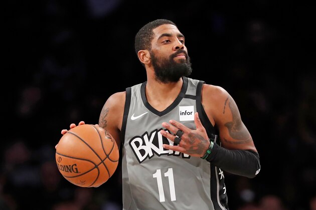 Brooklyn Nets guard Kyrie Irving (11) takes the ball down court during the second half of an NBA basketball game against the Detroit Pistons, Wednesday, Jan. 29, 2020, in New York. The Nets defeated the Pistons 125-115. (AP Photo/Kathy Willens)