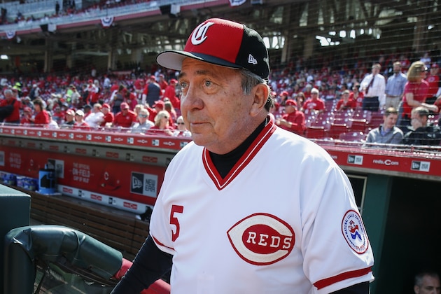 FILE - In this March 28, 2019, file photo, former Cincinnati Reds catcher Johnny Bench walks up to the field before the team's opening day baseball game against the Pittsburgh Pirates in Cincinnati. Bench has decided to sell memorabilia from his Hall of Fame career with the Reds. He plans to use the proceeds to help fund the future college educations of his two youngest sons. Among the items he's parting with are his World Series trophies from 1975 and '76, and his 1968 NL Rookie of the Year award. (AP Photo/Gary Landers, File)
