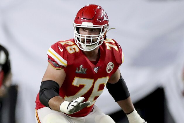 FILE - In this Feb. 2, 2020, file photo, Kansas City Chiefs offensive guard Laurent Duvernay-Tardif (76) blocks against the San Francisco 49ers at Super Bowl 54 in Miami Gardens, Fla. Duvernay-Tardif, of the Super Bowl champion Kansas City Chiefs, became the first player to opt out of the upcoming NFL season due to the coronavirus pandemic, Friday, July 24, 2020. (AP Photo/Gregory Payan, File) FILE - In this Feb. 2, 2020, file photo, Kansas City Chiefs offensive guard Laurent Duvernay-Tardif (76) blocks against the San Francisco 49ers at Super Bowl 54 in Miami Gardens, Fla. Duvernay-Tardif, of the Super Bowl champion Kansas City Chiefs, became the first player to opt out of the upcoming NFL season due to the coronavirus pandemic, Friday, July 24, 2020. (AP Photo/Gregory Payan, File)