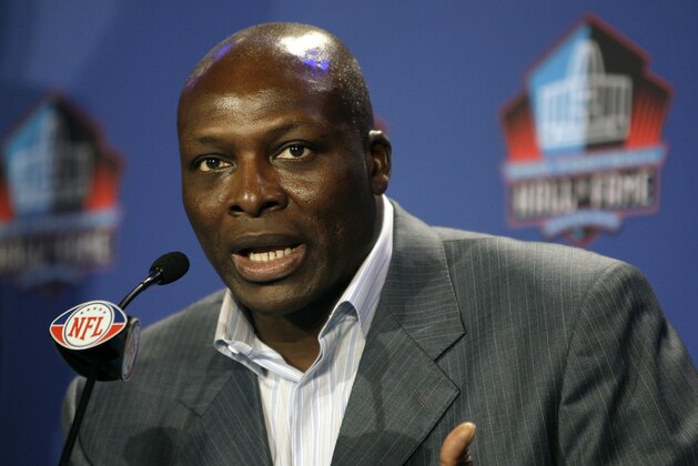 FILE- In this Jan. 31, 2009, file photo, former Buffalo Bills defensive end Bruce Smith gestures after being elected into the Pro Football Hall of Fame during a news conference in Tampa, Fla. Pro Football Hall of Famers Jack Youngblood and Bruce Smith have asked NFL owners to promise not to lock out players if a new labor deal isn't reached by early March.  In a letter obtained by The Associated Press on Tuesday, Feb. 15, 2011, Youngblood and Smith note the players' union already