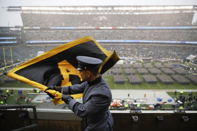 An Army cadet signals his classmates on the field ahead of an NCAA college football game between the Army and the Navy, Saturday, Dec. 14, 2019, in Philadelphia. (AP Photo/Matt Rourke)
