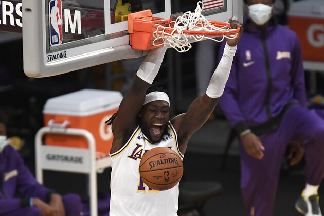 Los Angeles Lakers forward Montrezl Harrell dunks during the first half of the team's NBA preseason basketball game against the Los Angeles Clippers in Los Angeles, Friday, Dec. 11, 2020. (AP Photo/Kyusung Gong)