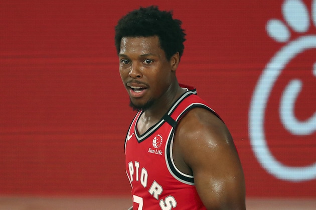 Toronto Raptors guard Kyle Lowry (7) reacts during the first half of an NBA basketball game against the Orlando Magic  Wednesday, Aug. 5, 2020, in Lake Buena Vista, Fla. (Kim Klement/Pool Photo via AP)