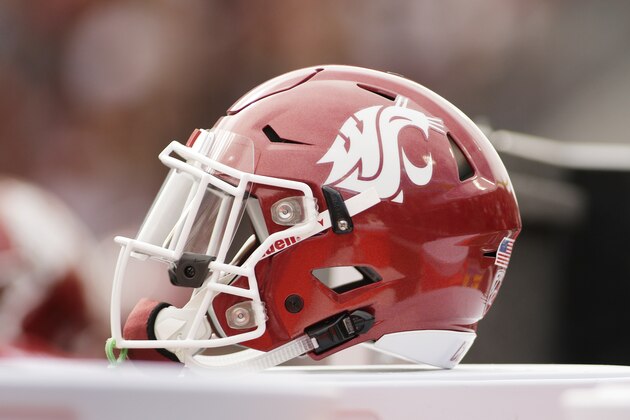 A Washington State helmet sits on the sideline during the first half of an NCAA college football game between Washington State and Northern Colorado in Pullman, Wash., Saturday, Sept. 7, 2019. (AP Photo/Young Kwak)