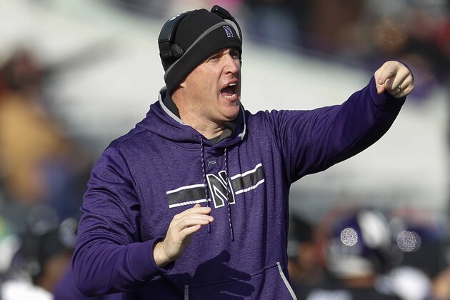 Northwestern coach Pat Fitzgerald calls out a play during the first half of an NCAA college football game against Massachusetts, Saturday, Nov. 16, 2019, in Evanston, Ill. (AP Photo/Jim Young)