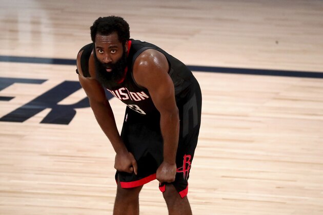 Houston Rockets guard James Harden takes a breather during the second half of Game 4 of an NBA basketball first-round playoff series, Monday, Aug. 24, 2020, in Lake Buena Vista, Fla. (Kim Klement/Pool Photo via AP)