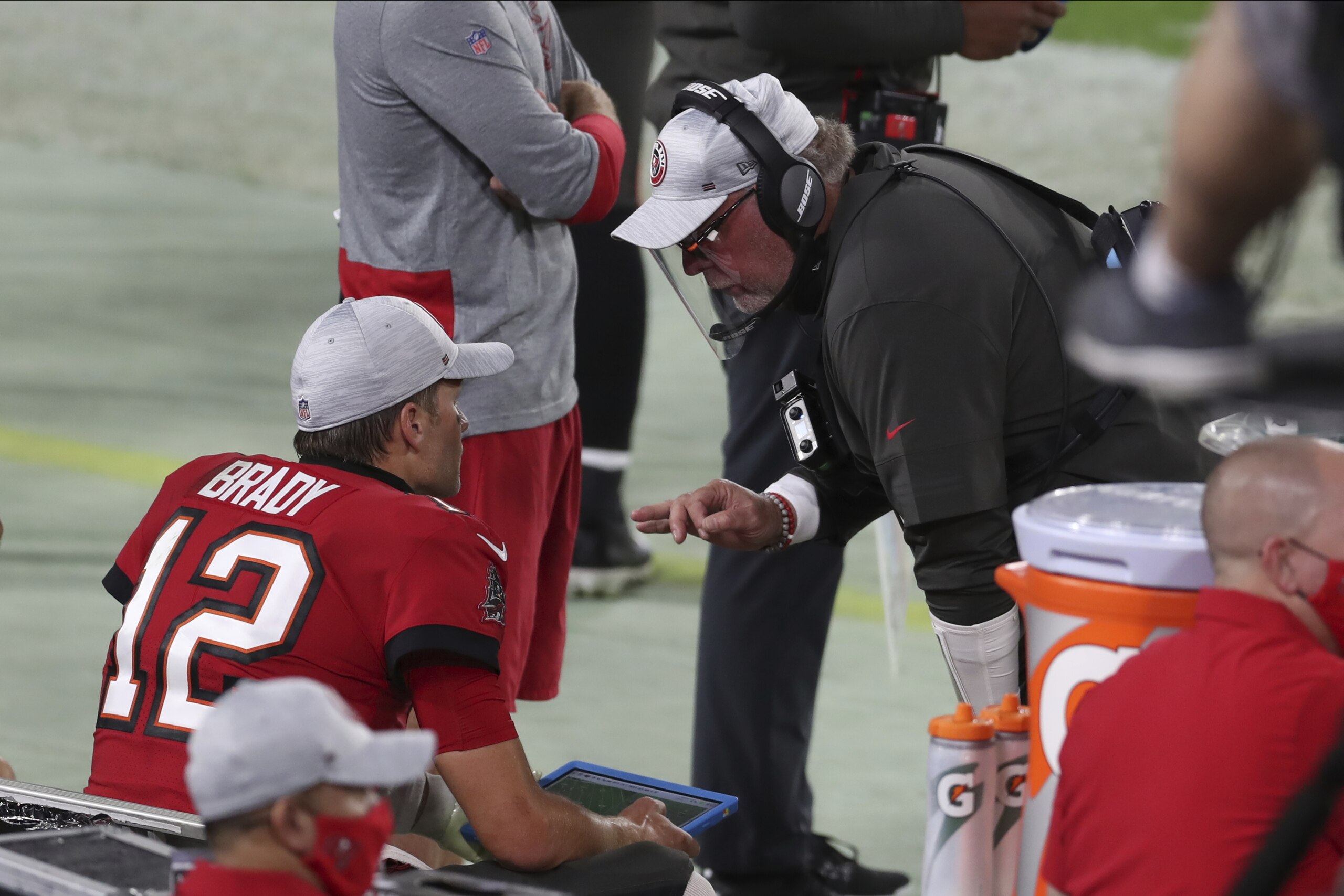 Tampa Bay Buccaneers head coach Bruce Arians talks to quarterback Tom Brady (12) during the second half of an NFL football game against the Kansas City Chiefs Sunday, Nov. 29, 2020, in Tampa, Fla. (AP Photo/Mark LoMoglio) Tampa Bay Buccaneers head coach Bruce Arians talks to quarterback Tom Brady (12) during the second half of an NFL football game against the Kansas City Chiefs Sunday, Nov. 29, 2020, in Tampa, Fla. (AP Photo/Mark LoMoglio)