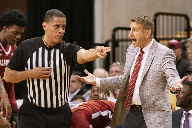 Alabama head coach Nate Oats, right, argues a call with a referee during the second half of an NCAA college basketball game against Missouri Saturday, March 7, 2020, in Columbia, Mo. Missouri won 69-50.(AP Photo/L.G. Patterson)