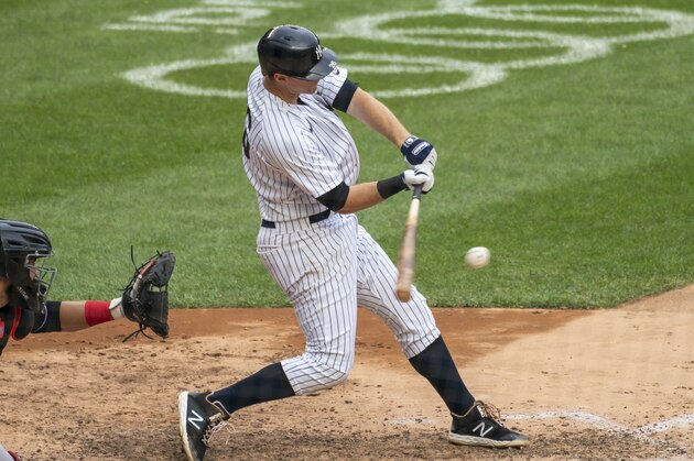 New York Yankees' DJ LeMahieu hits a two-run double during the sixth inning of a baseball game against the Miami Marlins at Yankee Stadium, Saturday, Sept. 26, 2020, in New York. (AP Photo/Corey Sipkin)