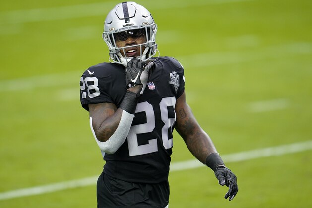 Las Vegas Raiders running back Josh Jacobs #28 warms up prior to playing the Denver Broncos during an NFL football game, Sunday, Nov. 15, 2020, in Las Vegas. (AP Photo/Jeff Bottari)