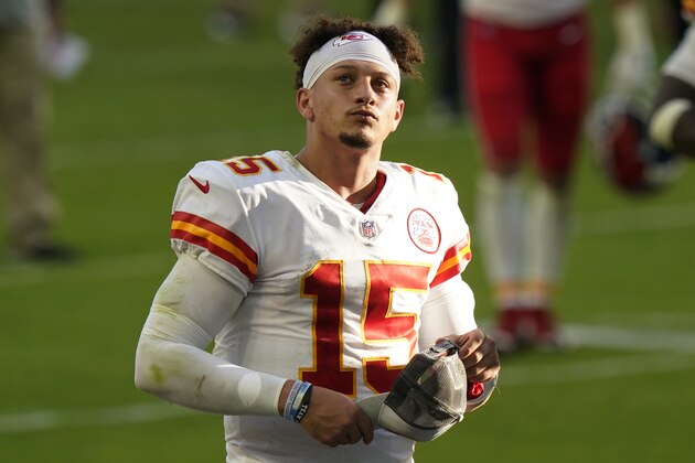 Kansas City Chiefs quarterback Patrick Mahomes (15) looks up at the end of an NFL football game against the Miami Dolphins, Sunday, Dec. 13, 2020, in Miami Gardens, Fla. The Chiefs defeated the Dolphins 33-27.(AP Photo/Lynne Sladky)