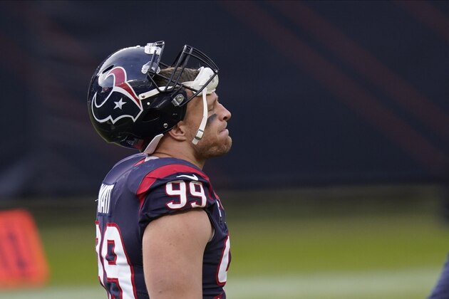 Houston Texans' J.J. Watt walks off the field following an NFL football game against the Chicago Bears, Sunday, Dec. 13, 2020, in Chicago. (AP Photo/Charles Rex Arbogast)