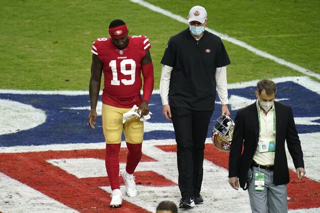 San Francisco 49ers wide receiver Deebo Samuel (19) walks off the field after getting injured during the first half of an NFL football game against the Washington Football Team, Sunday, Dec. 13, 2020, in Glendale, Ariz. (AP Photo/Ross D. Franklin)