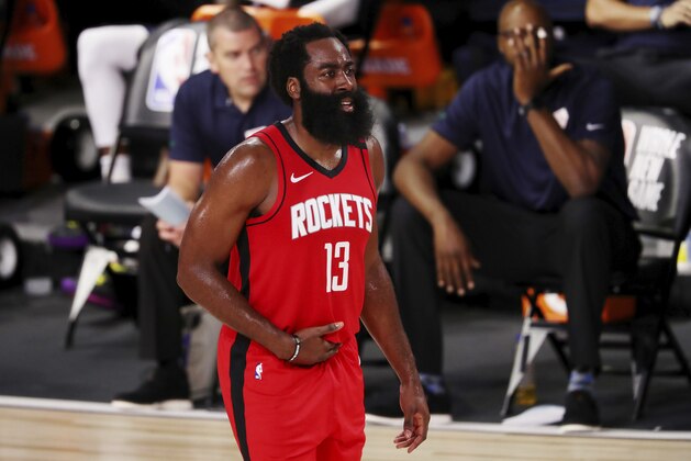 Houston Rockets James Harden (13) reacts against the Dallas Mavericks during the second half of an NBA basketball game Friday, July 31, 2020, in Lake Buena Vista, Fla. (Mike Ehrmann/Pool Photo via AP)