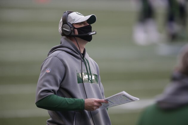 New York Jets head coach Adam Gase looks on against the Seattle Seahawks during the first half of an NFL football game, Sunday, Dec. 13, 2020, in Seattle. (AP Photo/Lindsey Wasson)