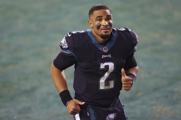 Philadelphia Eagles' quarterback Jalen Hurts (2) runs off the field after defeating the New Orleans Saints 24-21 in his first career start in an NFL football game, Sunday, Dec. 13, 2020, in Philadelphia. (AP Photo/Rich Schultz)