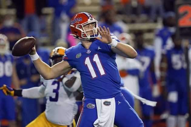 Florida quarterback Kyle Trask (11) throws a pass as LSU linebacker Andre Anthony (3) rushes during the first half of an NCAA college football game Saturday, Dec. 12, 2020, in Gainesville, Fla. (AP Photo/John Raoux) Florida quarterback Kyle Trask (11) throws a pass as LSU linebacker Andre Anthony (3) rushes during the first half of an NCAA college football game Saturday, Dec. 12, 2020, in Gainesville, Fla. (AP Photo/John Raoux)