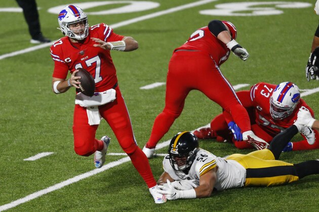 Buffalo Bills quarterback Josh Allen (17) is forced out of the pocket by Pittsburgh Steelers linebacker Alex Highsmith (56) during the first half of an NFL football game in Orchard Park, N.Y., Sunday, Dec. 13, 2020. (AP Photo/Jeffrey T. Barnes )