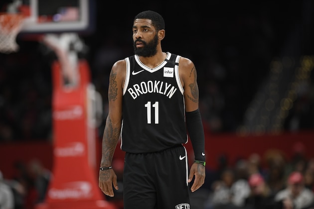 Brooklyn Nets guard Kyrie Irving (11) looks on during the second half of an NBA basketball game against the Washington Wizards, Saturday, Feb. 1, 2020, in Washington. The Wizards won 113-107. (AP Photo/Nick Wass)