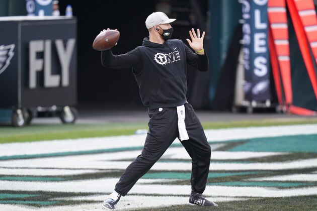 Philadelphia Eagles' Carson Wentz warms up before an NFL football game against the New Orleans Saints, Sunday, Dec. 13, 2020, in Philadelphia. (AP Photo/Chris Szagola)