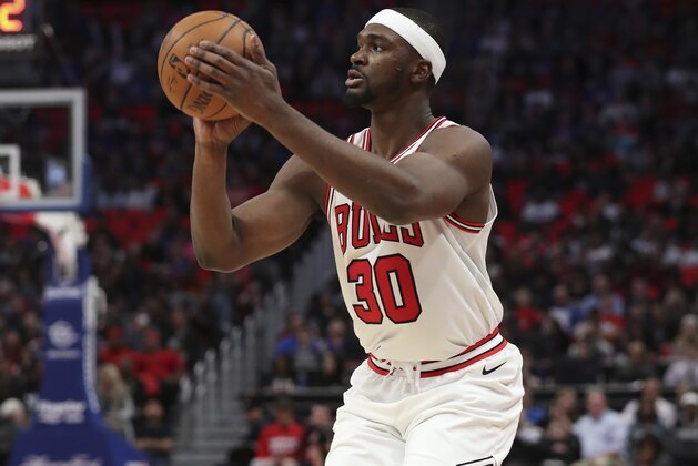 Chicago Bulls forward Noah Vonleh prepares to shoot during the second half of an NBA basketball game against the Detroit Pistons, Friday, March 9, 2018, in Detroit. (AP Photo/Carlos Osorio)