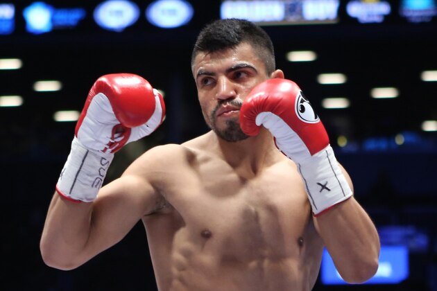 FILE - In this Jan. 30, 2014, file photo, Victor Ortiz faces Luis Collazo, not seen, in a welterweight boxing bout in the Brooklyn borough of New York. Former welterweight champion Ortiz has been charged with raping a woman inside a home in March. Police in Oxnard say the 31-year-old Ortiz turned himself in to Ventura County Sheriffs on Tuesday afternoon, Sept. 25, 2018. Police say the district attorney filed charges after a months-long investigation, and Ortiz surrendered after a warrant was issued for his arrest. (AP Photo/Julia Weeks, File) FILE - In this Jan. 30, 2014, file photo, Victor Ortiz faces Luis Collazo, not seen, in a welterweight boxing bout in the Brooklyn borough of New York. Former welterweight champion Ortiz has been charged with raping a woman inside a home in March. Police in Oxnard say the 31-year-old Ortiz turned himself in to Ventura County Sheriffs on Tuesday afternoon, Sept. 25, 2018. Police say the district attorney filed charges after a months-long investigation, and Ortiz surrendered after a warrant was issued for his arrest. (AP Photo/Julia Weeks, File)
