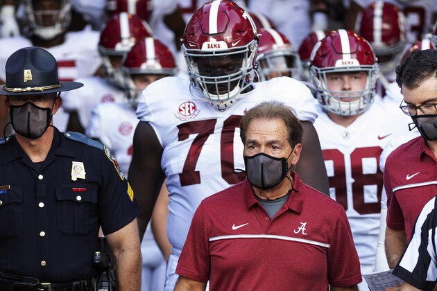 FILE - In this Sept. 26, 2020, file photo, Alabama coach Nick Saban leads his team to the field before an NCAA college football game against Missouri in Columbia, Mo. Alabama is No. 1 in The Associated Press college football poll for the first time this year, extending its record of consecutive seasons with at least one week on top of the rankings to 13. (AP Photo/L.G. Patterson, File) FILE - In this Sept. 26, 2020, file photo, Alabama coach Nick Saban leads his team to the field before an NCAA college football game against Missouri in Columbia, Mo. Alabama is No. 1 in The Associated Press college football poll for the first time this year, extending its record of consecutive seasons with at least one week on top of the rankings to 13. (AP Photo/L.G. Patterson, File)