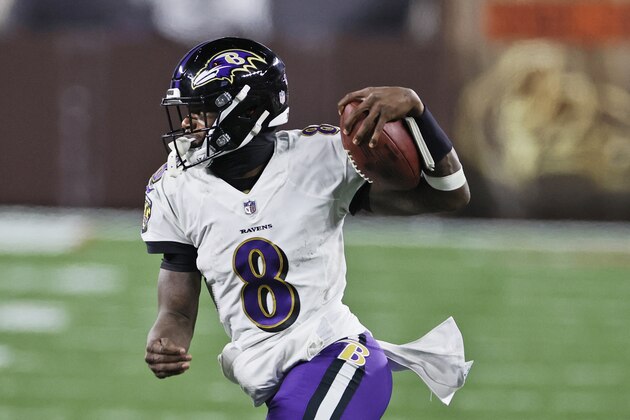 Baltimore Ravens quarterback Lamar Jackson (8) scrambles during the second half of an NFL football game against the Cleveland Browns, Monday, Dec. 14, 2020, in Cleveland. (AP Photo/Ron Schwane)