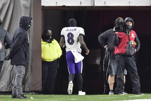 Baltimore Ravens quarterback Lamar Jackson (8) runs to the locker room during the second half of an NFL football game against the Cleveland Browns, Monday, Dec. 14, 2020, in Cleveland. (AP Photo/David Richard)