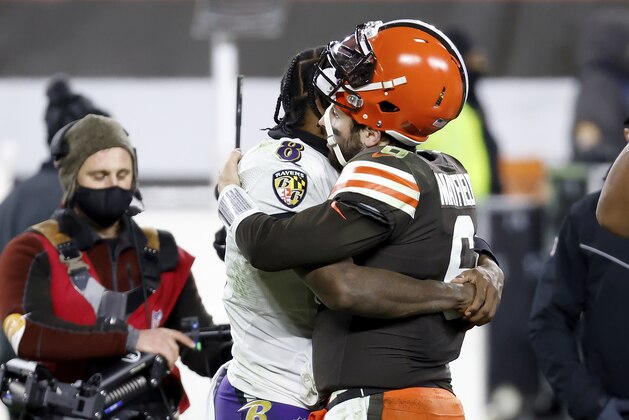 Baltimore Ravens quarterback Lamar Jackson (8) hugs Cleveland Browns quarterback Baker Mayfield (6) after an NFL football game, Monday, Dec. 14, 2020, in Cleveland. (AP Photo/Kirk Irwin)