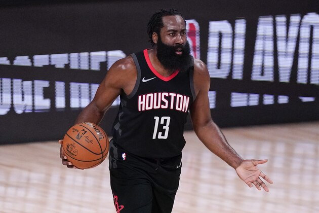 FILE - In this Sept. 12, 2020, file photo, Houston Rockets' James Harden (13) argues a call during the first half of an NBA conference semifinal playoff basketball game against the Los Angeles Lakers in Lake Buena Vista, Fla. Harden has not reported to training camp with the Rockets and coach Stephen Silas says he did not know when the All-Star guard would arrive. The Rockets had their second workout of training camp on Monday, Dec. 7, 2020, and afterward the new coach addressed the absence of the disgruntled star who reportedly wants to be traded. (AP Photo/Mark J. Terrill, File)