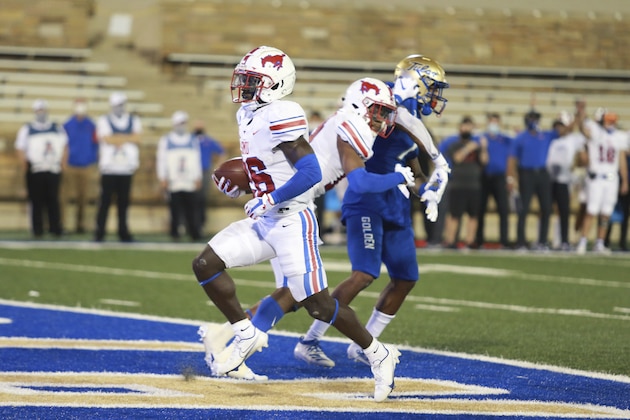SMU running back Ulysses Bentley IV (26) scores a touchdown against Tulsa during the first half of an NCAA college football game in Tulsa, Okla., Saturday, Nov. 14, 2020. (AP Photo/Joey Johnson)