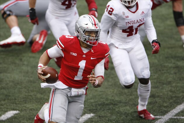 Ohio State quarterback Justin Fields plays against Indiana during an NCAA college football game Saturday, Nov. 21, 2020, in Columbus, Ohio. (AP Photo/Jay LaPrete) Ohio State quarterback Justin Fields plays against Indiana during an NCAA college football game Saturday, Nov. 21, 2020, in Columbus, Ohio. (AP Photo/Jay LaPrete)