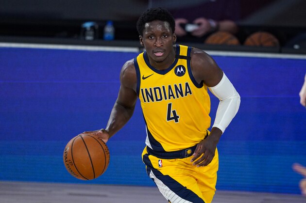 Indiana Pacers guard Victor Oladipo (4) plays against the Orlando Magic during the first half of an NBA basketball game Tuesday, Aug. 4, 2020 in Lake Buena Vista, Fla. (AP Photo/Ashley Landis)