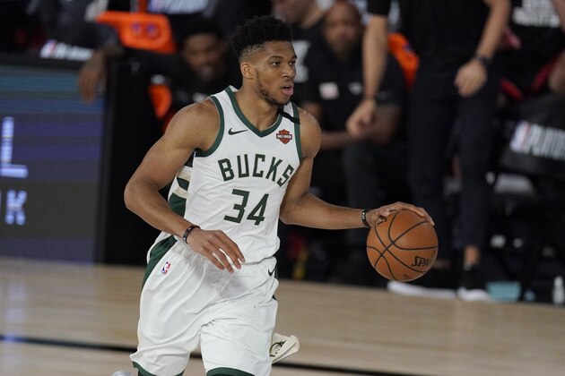 Milwaukee Bucks' Giannis Antetokounmpo (34) in the second half of an NBA conference semifinal playoff basketball game against the Miami Heat Friday, Sept. 4, 2020, in Lake Buena Vista, Fla. (AP Photo/Mark J. Terrill) Milwaukee Bucks' Giannis Antetokounmpo (34) in the second half of an NBA conference semifinal playoff basketball game against the Miami Heat Friday, Sept. 4, 2020, in Lake Buena Vista, Fla. (AP Photo/Mark J. Terrill)