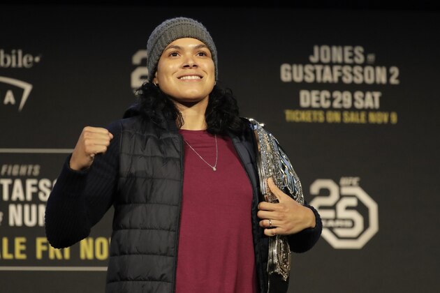 Amanda Nunes holds her belt after talking about her mixed martial arts featherweight bout against Cris Cybor scheduled for UFC 232 in Las Vegas, Friday, Nov. 2, 2018, during a news conference at Madison Square Garden in New York. (AP Photo/Julio Cortez) Amanda Nunes holds her belt after talking about her mixed martial arts featherweight bout against Cris Cybor scheduled for UFC 232 in Las Vegas, Friday, Nov. 2, 2018, during a news conference at Madison Square Garden in New York. (AP Photo/Julio Cortez)