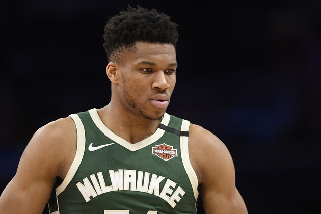 Milwaukee Bucks forward Giannis Antetokounmpo (34) stands on the court during the second half of an NBA basketball game against the Washington Wizards, Monday, Feb. 24, 2020, in Washington. The Bucks won 137-134 in overtime. (AP Photo/Nick Wass)