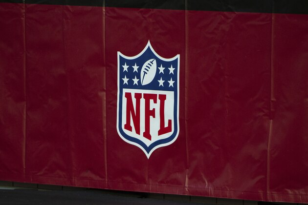 A detail view of the NFL logo on a banner on display during an NFL football game between the Los Angeles Rams and Arizona Cardinals, Sunday, Dec. 6, 2020, in Glendale, Ariz. (AP Photo/Jennifer Stewart)
