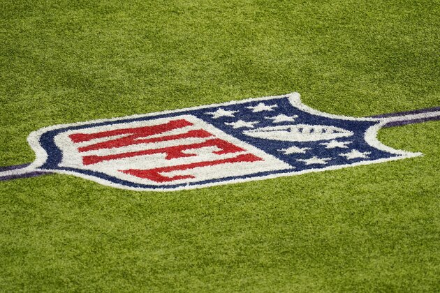 The NFL logo is seen on the field before an NFL football game between the Minnesota Vikings and the Jacksonville Jaguars, Sunday, Dec. 6, 2020, in Minneapolis. (AP Photo/Charlie Neibergall)