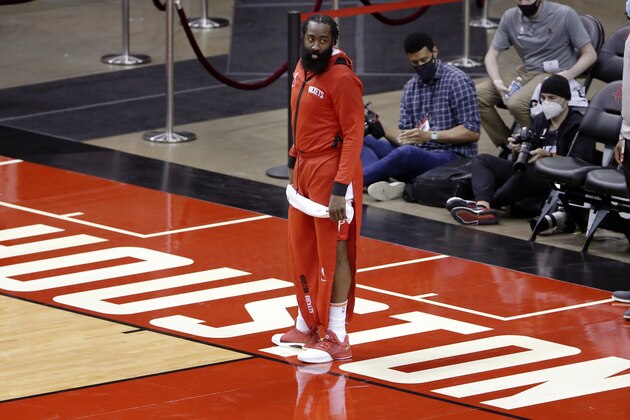 Houston Rockets guard James Harden leaves the court after their win against the San Antonio Spurs after an NBA basketball game Tuesday, Dec. 15, 2020, in Houston. (AP Photo/Michael Wyke)