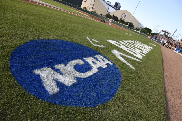 The NCAA logo is painted alongside the visitor dugout at Olsen Field before the start of a NCAA college baseball super regional tournament game between TCU and Texas A&M, Friday, June 10, 2016, in College Station, Texas. TCU won game one of the series 8-2. (AP Photo/Sam Craft)