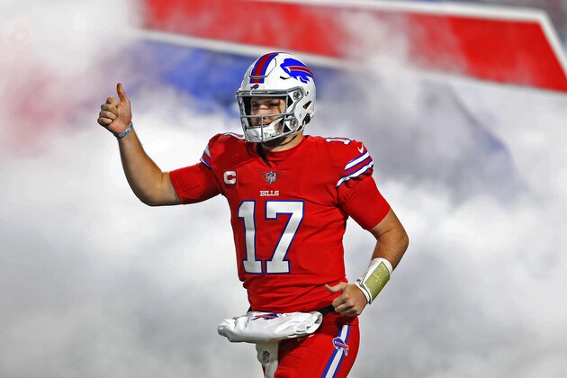 Buffalo Bills quarterback Josh Allen (17) runs onto the field for the first half of an NFL football game against the Pittsburgh Steelers in Orchard Park, N.Y., Sunday, Dec. 13, 2020. The Bills won 26-15. (AP Photo/Jeffrey T. Barnes )