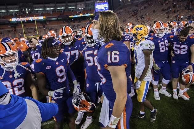 Clemson quarterback Trevor Lawrence (16) and teammates gather after defeating Pittsburgh 52-17 in his last home game with the team, in an NCAA college football game Saturday, NovÂ 28, 2020, in Clemson, S.C. (Ken Ruinard/The Independent-Mail via AP, Pool)