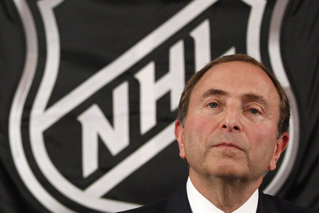 FILE - In this Sept. 13, 2012, file photo, NHL commissioner Gary Bettman listens as he meets with reporters after a meeting with team owners in New York. The National Hockey Leage Players' Association announces its decision whether to terminate the current collective bargaining agreement and set the clock ticking toward another potential work stoppage in 2020. (AP Photo/Mary Altaffer, File)